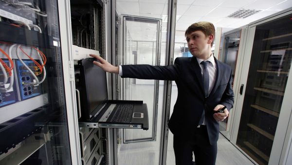 A technical support engineer working at the new air traffic control center in Kaliningrad's Khrabrovo Airport A technical support engineer working at the new air traffic control center in Kaliningrad's Khrabrovo Airport - Sputnik International