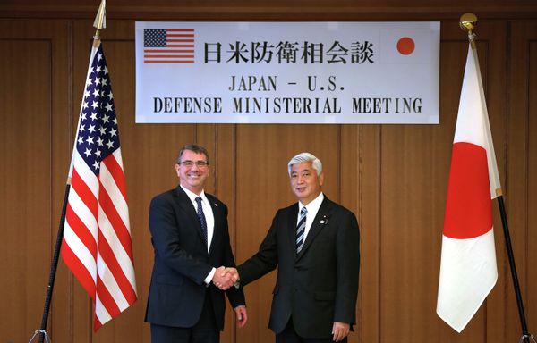 U.S. Defense Secretary Ash Carter, left, and Japan's Defense Minister Gen Nakatani shake hands prior to a meeting at the Defense Ministry in Tokyo. U.S. Defense Secretary Ash Carter, left, and Japan's Defense Minister Gen Nakatani shake hands prior to a meeting at the Defense Ministry in Tokyo. - Sputnik International