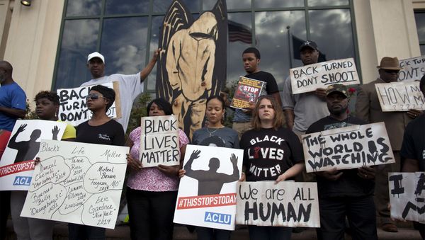 Protesters carry signs at a rally in North Charleston, South Carolina April 8, 2015 Protesters carry signs at a rally in North Charleston, South Carolina April 8, 2015 - Sputnik International
