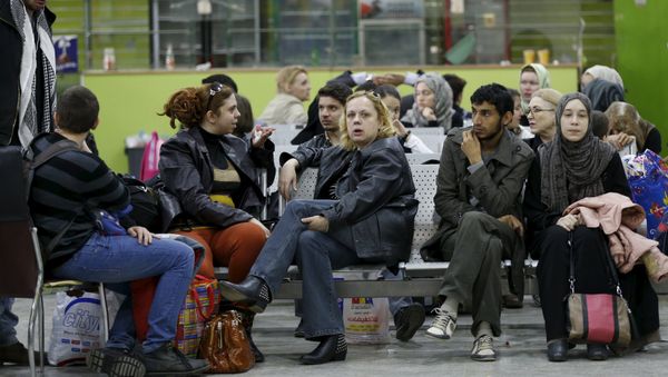 People wait in the departure lounge at Sanaa International Airport, where foreigners are being evacuated from Yemen People wait in the departure lounge at Sanaa International Airport, where foreigners are being evacuated from Yemen - Sputnik International