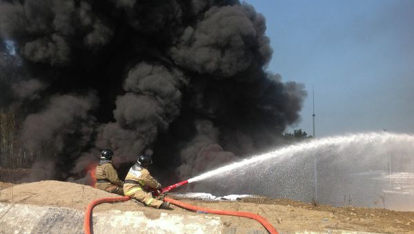 Oil tank catches fire in Irkutsk Region - Sputnik International