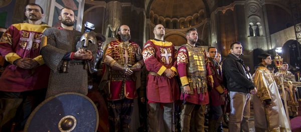 Men dressed as Serbian knights attend an Orthodox Easter service in the St. Sava temple in Belgrade Men dressed as Serbian knights attend an Orthodox Easter service in the St. Sava temple in Belgrade - Sputnik International