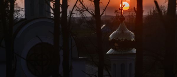 The Sun sets behind the St. Yelisei’s Lavrishevo monetary during Orthodox Easter at the village of Gnesichi in the Grodno region, about 150 km from Minsk - Sputnik International