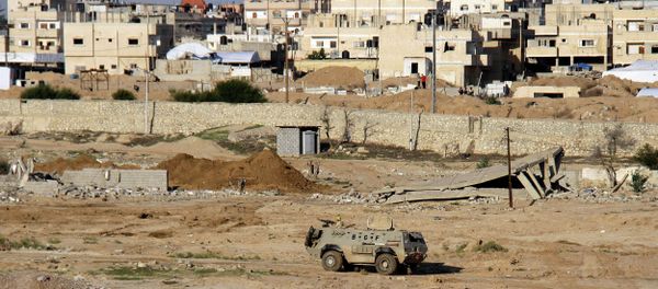 Egyptian army armored vehicle stands on the on the Egyptian side of border town of Rafah, north Sinai, Egypt Egyptian army armored vehicle stands on the on the Egyptian side of border town of Rafah, north Sinai, Egypt - Sputnik International
