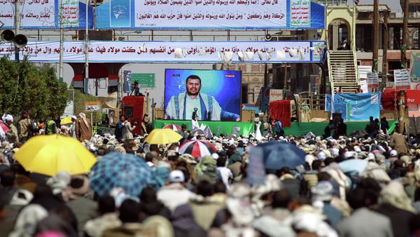 Yemeni Shiite supporters of the Huthi movement watch the movement leader Abdul-Malik al-Houthi deliver a televised speech during Eid al-Ghadir celebrations in the capital Sanaa. fILE PHOTO Yemeni Shiite supporters of the Huthi movement watch the movement leader Abdul-Malik al-Houthi deliver a televised speech during Eid al-Ghadir celebrations in the capital Sanaa. fILE PHOTO - Sputnik International