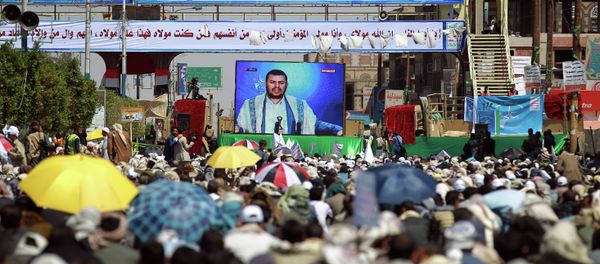 Yemeni Shiite supporters of the Huthi movement watch the movement leader Abdul-Malik al-Houthi deliver a televised speech during Eid al-Ghadir celebrations in the capital Sanaa. fILE PHOTO Yemeni Shiite supporters of the Huthi movement watch the movement leader Abdul-Malik al-Houthi deliver a televised speech during Eid al-Ghadir celebrations in the capital Sanaa. fILE PHOTO - Sputnik International
