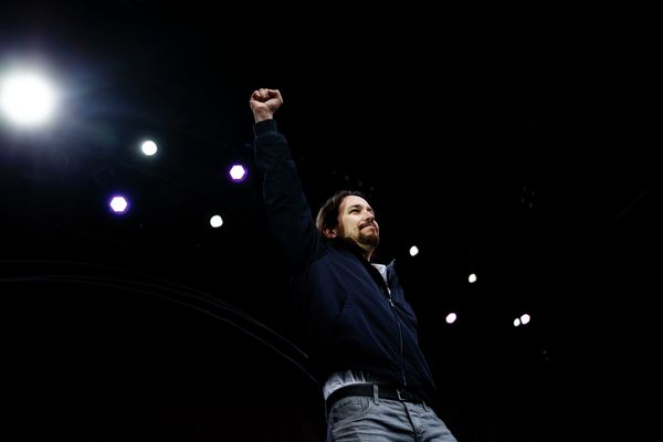 Pablo Iglesias, leader of Spanish Podemos (We Can) left-wing party, rises his fist on the stage before giving a speech to his supporters Pablo Iglesias, leader of Spanish Podemos (We Can) left-wing party, rises his fist on the stage before giving a speech to his supporters - Sputnik International