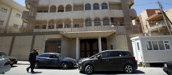 A man walks past the South Korean embassy after it was attacked by gunmen in Tripoli April 12, 2015. A man walks past the South Korean embassy after it was attacked by gunmen in Tripoli April 12, 2015. - Sputnik International