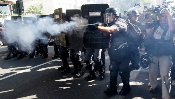 Police fire rubber bullets at protestors in Sao Paulo, Brazil, Thursday, June 12, 2014 - Sputnik International