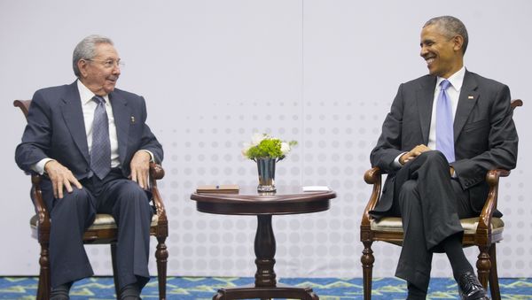 US President Barack Obama, right, smiles as he looks over towards Cuban President Raul Castro, left, during their meeting at the Summit of the Americas in Panama City US President Barack Obama, right, smiles as he looks over towards Cuban President Raul Castro, left, during their meeting at the Summit of the Americas in Panama City - Sputnik International