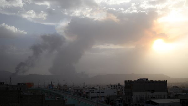 Smoke billows at a military site after it was hit by an air strike at the Faj Attan mountain of Sanaa Smoke billows at a military site after it was hit by an air strike at the Faj Attan mountain of Sanaa - Sputnik International