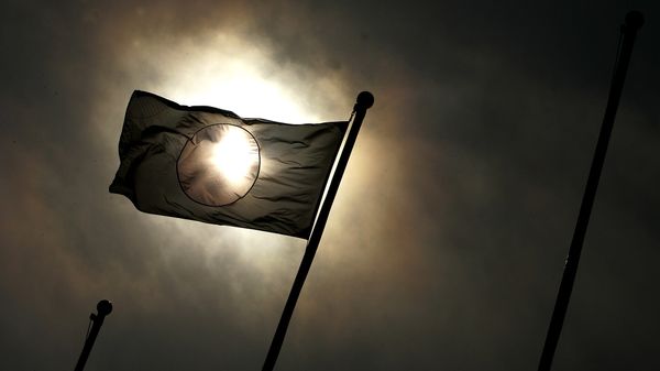 The Japanese flag flies over the island during the 60th anniversary of the Battle of Iwo JIma on Iwo Jima, Japan on Saturday March 12, 2005 - Sputnik International