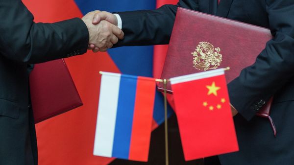 Vladimir Putin pays official visit to People's Republic of China - Sputnik International