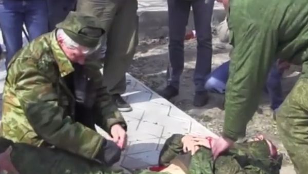 A journalist working for Russian television was seriously injured when he stepped onto a trip-wired booby trap in eastern Ukraine, while covering a ceasefire monitoring mission. - Sputnik International