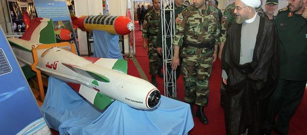 Iran's President Hassan Rouhani, second right, listens to Defense Minister Hossein Dehghan, right, while visiting a defense industry display in Tehran, Iran, Sunday, Aug. 24, 2014 Iran's President Hassan Rouhani, second right, listens to Defense Minister Hossein Dehghan, right, while visiting a defense industry display in Tehran, Iran, Sunday, Aug. 24, 2014 - Sputnik International