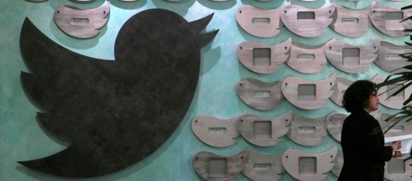 A woman walks past artwork at tech company Twitter's office space in Santa Monica, California A woman walks past artwork at tech company Twitter's office space in Santa Monica, California - Sputnik International