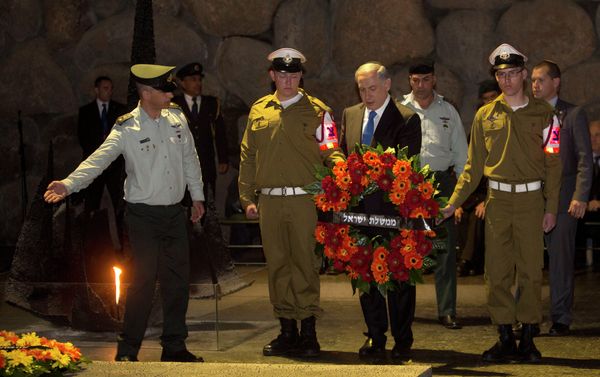 Israeli Prime Minister Benjamin Netanyahu lays a wreath during a ceremony marking the annual Holocaust Remembrance Day at the Hall of Remembrance at the Yad Vashem Holocaust memorial, in Jerusalem Israeli Prime Minister Benjamin Netanyahu lays a wreath during a ceremony marking the annual Holocaust Remembrance Day at the Hall of Remembrance at the Yad Vashem Holocaust memorial, in Jerusalem - Sputnik International