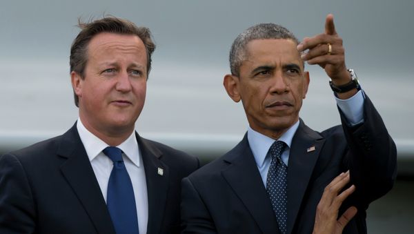 US President Barack Obama, right, stands alongside British Prime Minister David Cameron US President Barack Obama, right, stands alongside British Prime Minister David Cameron - Sputnik International