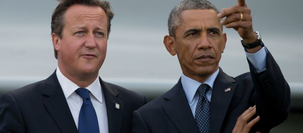 US President Barack Obama, right, stands alongside British Prime Minister David Cameron US President Barack Obama, right, stands alongside British Prime Minister David Cameron - Sputnik International