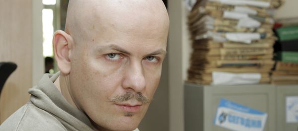 Journalist Oles Buzina looks on at the office of Sevodnya daily newspaper in Kiev in this October 12, 2012 file photo. Journalist Oles Buzina looks on at the office of Sevodnya daily newspaper in Kiev in this October 12, 2012 file photo. - Sputnik International