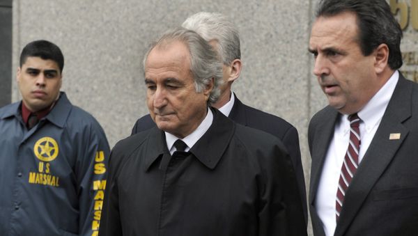 Disgraced Wall Street financier Bernard Madoff leaves US Federal Court after a hearing on March 10, 2009 in New York - Sputnik International