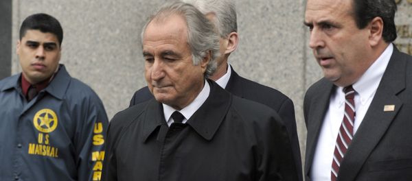 Disgraced Wall Street financier Bernard Madoff leaves US Federal Court after a hearing on March 10, 2009 in New York - Sputnik International