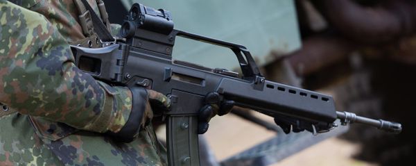 German soldier holds a Heckler & Koch G36 assault rifle at a military training ground near Weisskeissel,  Germany - Sputnik International