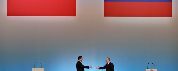 China's President Xi Jinping (L) is welcomed by his Russian counterpart Vladimir Putin (R) during the opening ceremony of The Year of Chinese Tourism in Russia in Moscow China's President Xi Jinping (L) is welcomed by his Russian counterpart Vladimir Putin (R) during the opening ceremony of The Year of Chinese Tourism in Russia in Moscow - Sputnik International