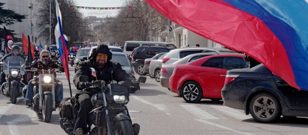 President of the All-Russian Motorcycle Club Night Wolves Alexander Zaldostanov, center, during a motor rally called Russian Spring Roads timed to coincide with the first anniversary of Crimea's reunification with Russia, in Sevastopol. President of the All-Russian Motorcycle Club Night Wolves Alexander Zaldostanov, center, during a motor rally called Russian Spring Roads timed to coincide with the first anniversary of Crimea's reunification with Russia, in Sevastopol. - Sputnik International