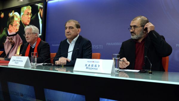 (R-L) A senior member of the opposition National Coordination Committee Majid Habbo, former Syrian Deputy Prime Minister Qadri Jamil, a leader of the Popular Front of Change and Liberation, and Samir Aita, the Arabic editor of Le Monde Diplomatique and the founder of the Syrian Democratic Forum, attend a press conference after talks between representatives of the Syrian government and the opposition in Moscow, on January 30, 2015 - Sputnik International