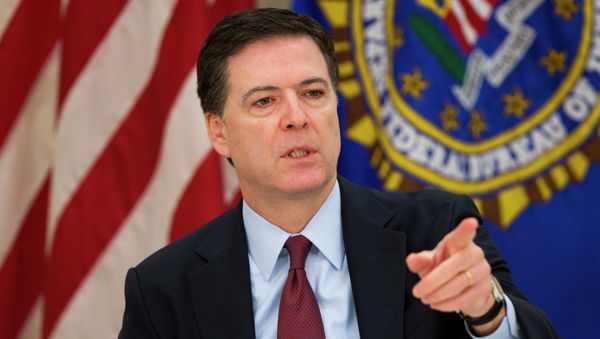 FBI director James Comey gestures during a news conference at FBI headquarters in Washington, Wednesday, March 25, 2015 - Sputnik International