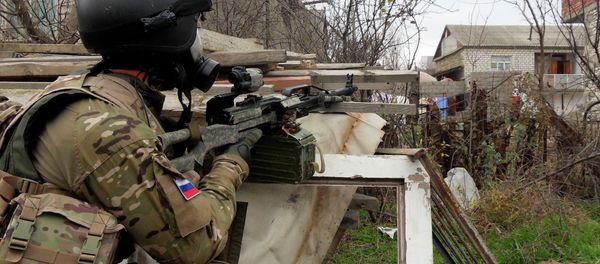 In this file photo dated Dec. 29, 2010, a Russian Special Forces officer aims his weapon during a security raid at a village outside Makhachkala, the regional capital of Russia's province of Dagestan In this file photo dated Dec. 29, 2010, a Russian Special Forces officer aims his weapon during a security raid at a village outside Makhachkala, the regional capital of Russia's province of Dagestan - Sputnik International