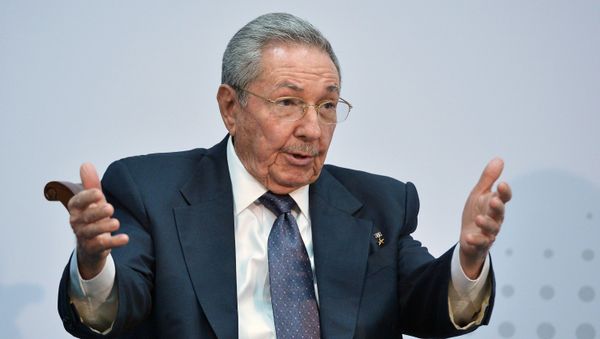 Cuba's President Raul Castro speaks with US President Barack Obama (out of frame) on the sidelines of the Summit of the Americas at the ATLAPA Convention center on April 11, 2015 in Panama City - Sputnik International
