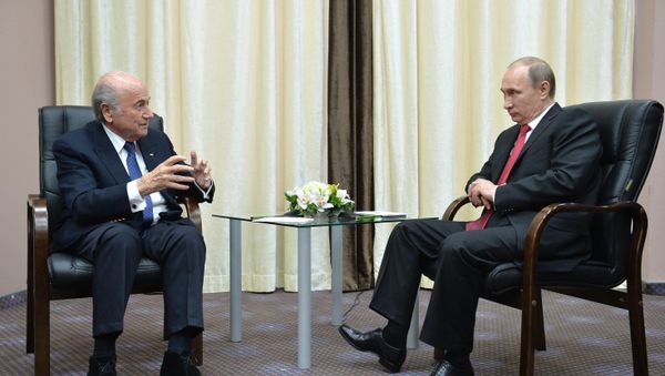 Russian President Vladimir Putin (right) and FIFA President Joseph S. Blatter Russian President Vladimir Putin (right) and FIFA President Joseph S. Blatter - Sputnik International
