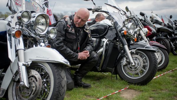 Motorcyclists attend a mass during the annual Polish motorcyclists pilgrimage to the Jasna Gora monastery, the country's greatest place of pilgrimage hosting the Black Madonna of Czestochowa in Czestochowa, Poland, April 19, 2015 - Sputnik International