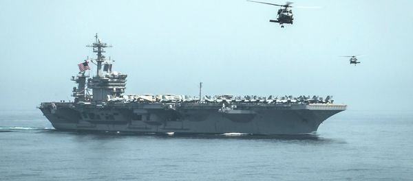 Helicopters fly from the aircraft carrier USS Theodore Roosevelt Helicopters fly from the aircraft carrier USS Theodore Roosevelt - Sputnik International