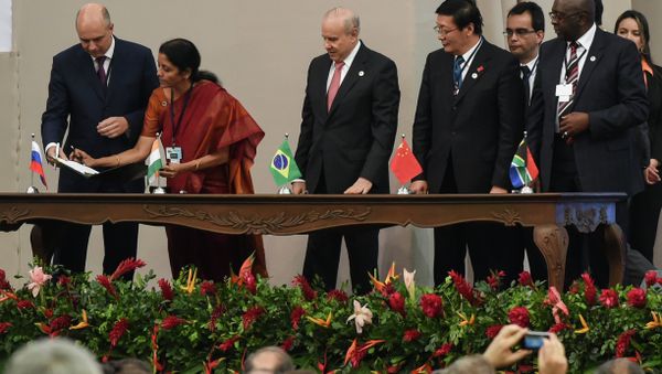 Delegates of the countries members of the BRICS (Brazil, Russia, India, China and South Africa) sign the creation of their new development bank during the 6th BRICS Summit in Fortaleza, Brazil, on July 15, 2014 Delegates of the countries members of the BRICS (Brazil, Russia, India, China and South Africa) sign the creation of their new development bank during the 6th BRICS Summit in Fortaleza, Brazil, on July 15, 2014 - Sputnik International