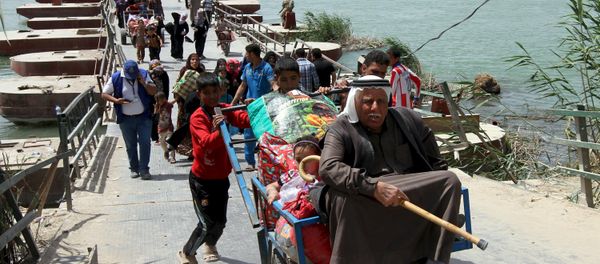 Displaced Sunni people, who fled the violence in the city of Ramadi, arrive at the outskirts of Baghdad, April 18, 2015 Displaced Sunni people, who fled the violence in the city of Ramadi, arrive at the outskirts of Baghdad, April 18, 2015 - Sputnik International