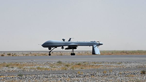 US Predator unmanned drone armed with a missile US Predator unmanned drone armed with a missile - Sputnik International