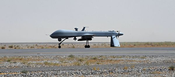 US Predator unmanned drone armed with a missile - Sputnik International