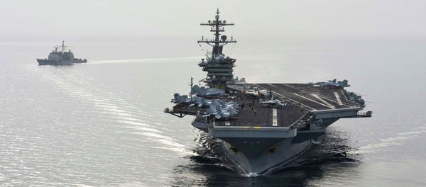 The aircraft carrier USS Theodore Roosevelt (CVN 71) and the guided-missile cruiser USS Normandy (CG) 60 sail in the Arabian Sea, in this U.S. Navy photo taken April 16, 2015 The aircraft carrier USS Theodore Roosevelt (CVN 71) and the guided-missile cruiser USS Normandy (CG) 60 sail in the Arabian Sea, in this U.S. Navy photo taken April 16, 2015 - Sputnik International