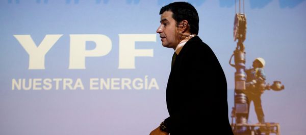 Miguel Galuccio, CEO of Argentina's state-controlled YPF oil company, walks in front of a screen during a joint news conference with Ali Moshiri, Chevron's head of Latin America, Middle East and Africa, in Buenos Aires, Argentina, Thursday, Aug. 29, 2013 Miguel Galuccio, CEO of Argentina's state-controlled YPF oil company, walks in front of a screen during a joint news conference with Ali Moshiri, Chevron's head of Latin America, Middle East and Africa, in Buenos Aires, Argentina, Thursday, Aug. 29, 2013 - Sputnik International