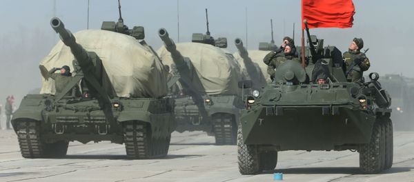 Self-propelled artillery system Koalitsiya-SV (L) and BTR-82A (R) armoured personnel carrier at the May 9 Victory Parade rehearsal in Moscow region. Self-propelled artillery system Koalitsiya-SV (L) and BTR-82A (R) armoured personnel carrier at the May 9 Victory Parade rehearsal in Moscow region. - Sputnik International