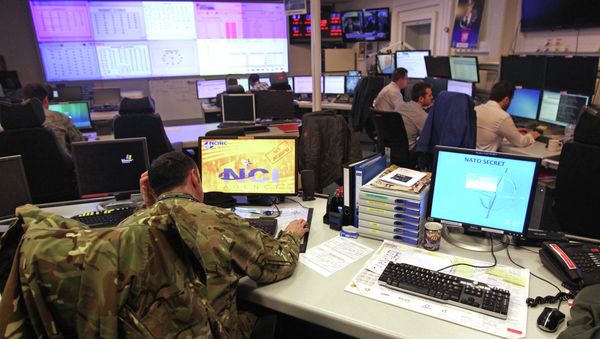 Staff operate at the NATO Computer Incident Response Capability (NCIRC) technical center, at NATO's military headquarters SHAPE in Mons, southwestern Belgium, Tuesday, Dec. 10, 2013. The NCIRC protects NATO systems and information from any form of attack and from deliberate or accidental exposure. - Sputnik International