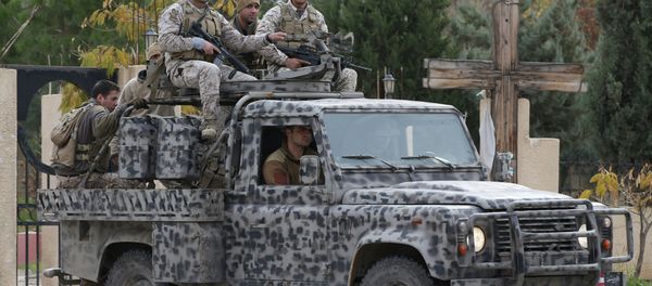 Lebanese army special forces patrol near the area militants ambushed Lebanese soldiers, in Ras Baalbek town, eastern Lebanon, Wednesday, Dec. 3, 2014 Lebanese army special forces patrol near the area militants ambushed Lebanese soldiers, in Ras Baalbek town, eastern Lebanon, Wednesday, Dec. 3, 2014 - Sputnik International