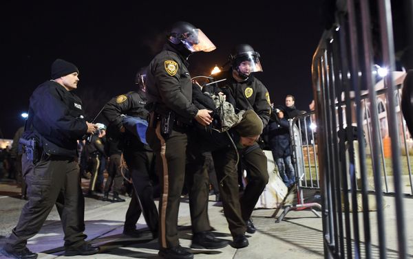 Police detain a protester outside the police station in Ferguson, Missouri, on November 25, 2014 Police detain a protester outside the police station in Ferguson, Missouri, on November 25, 2014 - Sputnik International