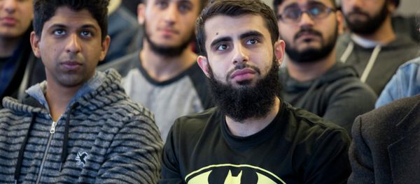 Students at Queens College in New York gather for a vigil, Wednesday, Feb. 18, 2015, in honor of three Muslim students killed recently near the University of North Carolina - Sputnik International
