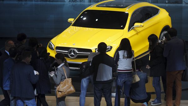Visitors walk around a Mercedes Benz concept GLC Coupe car during the 16th Shanghai International Automobile Industry Exhibition in Shanghai Visitors walk around a Mercedes Benz concept GLC Coupe car during the 16th Shanghai International Automobile Industry Exhibition in Shanghai - Sputnik International