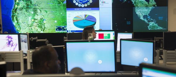 Staff members sit at their work stations at the National Cybersecurity and Communications Integration Center in Arlington, Virginia, January 13, 2015 Staff members sit at their work stations at the National Cybersecurity and Communications Integration Center in Arlington, Virginia, January 13, 2015 - Sputnik International