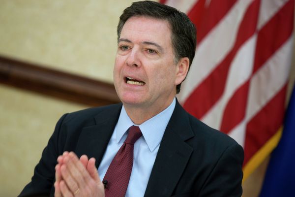 FBI director James Comey gestures during a news conference at FBI headquarters in Washington FBI director James Comey gestures during a news conference at FBI headquarters in Washington - Sputnik International